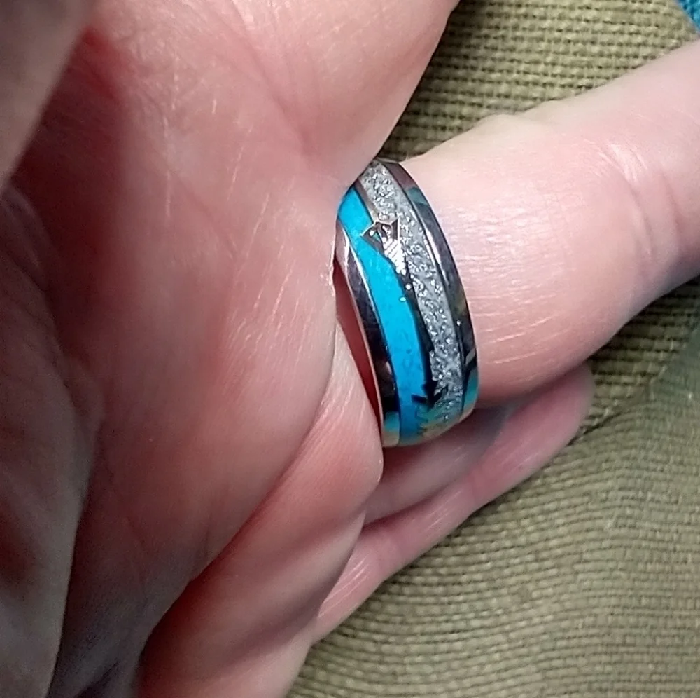 Silvertone faux blue turquoise grey glitter band arrow ring